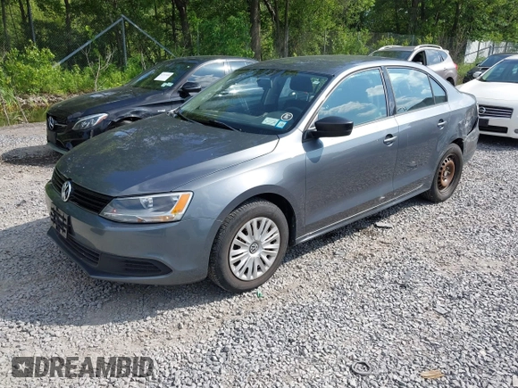 2014 Volkswagen Jetta S with VIN 3VW2K7AJ2EM352047, listed as a IAAI auction lot 42556420 with 104,798 mi miles and . Bid and sale history available at DreamBid. Image 2.