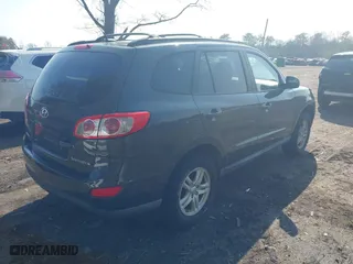 2010 Hyundai Santa Fe GLS with VIN 5NMSG3AB2AH390591, listed as a IAAI auction lot 42042117 with 240,875 mi miles. Bid and sale history available at carsss.com. Image 4.