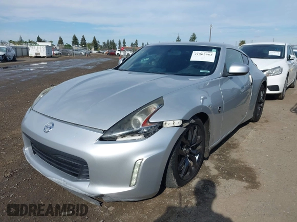 2018 Nissan 370Z Sport with VIN JN1AZ4EH7JM572602, listed as a IAAI auction lot 41902662 with 76,262 mi miles and . Bid and sale history available at DreamBid. Image 2.