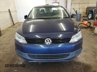 2014 Volkswagen Jetta SE with VIN 3VWD17AJ7EM428230, listed as a Copart auction lot 63944345 with 166,370 mi miles and Clean title. Bid and sale history available at DreamBid. Image 5.
