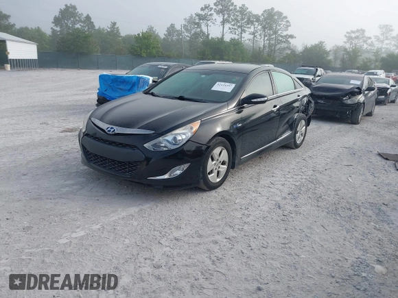 2012 Hyundai Sonata Hybrid with VIN KMHEC4A41CA054312, listed as a IAAI auction lot 42124397 with 49,581 mi miles and . Bid and sale history available at DreamBid. Image 2.