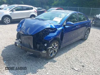 2021 Kia Forte LXS with VIN 3KPF24AD4ME283299, listed as a IAAI auction lot 42414578 with 66,852 mi miles and . Bid and sale history available at DreamBid. Image 2.