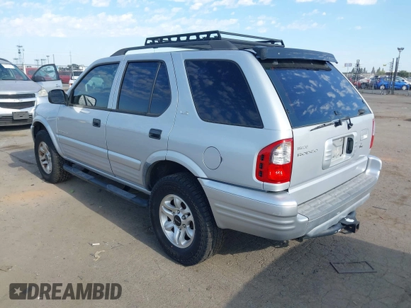 2002 Isuzu Rodeo S with VIN 4S2CK58W024342335, listed as a IAAI auction lot 42595434 with 144,529 mi miles and . Bid and sale history available at DreamBid. Image 3.