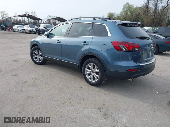 2015 Mazda CX-9 Touring with VIN JM3TB3CVXF0460959, listed as a IAAI auction lot 41940912 with 166,674 mi miles and . Bid and sale history available at DreamBid. Image 3.