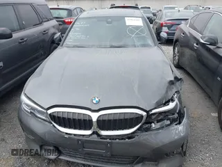 2021 BMW 3 Series 330i with VIN 3MW5R1J07M8C06389, listed as a IAAI auction lot 42024380 with 30,861 mi miles and . Bid and sale history available at DreamBid. Image 13.