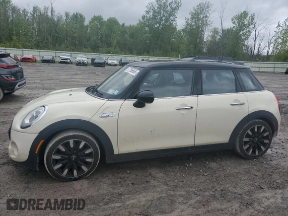 2015 MINI Hardtop 4 Door S with VIN WMWXU3C54F2B62612, listed as a Copart auction lot 57756665 with 107,787 mi miles and Salvage title. Bid and sale history available at DreamBid. Image 1.
