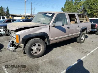 1993 GMC Suburban z VIN 1GKGK26NXPJ711771, wystawiony jako Copart lot #85515174 z przebiegiem 63 064 mil mil oraz Szkoda całkowita • Salvage title. Historia ofert i sprzedaży dostępna na DreamBid. Obrazek 1.
