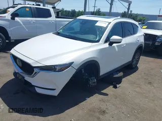 2020 Mazda CX-5 Grand Touring with VIN JM3KFADM9L0821930, listed as a IAAI auction lot 42549986 with 29,929 mi miles and . Bid and sale history available at DreamBid. Image 17.