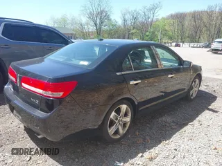 2012 Lincoln MKZ with VIN 3LNHL2GC2CR801499, listed as a IAAI auction lot 42144202 with 168,294 mi miles. Bid and sale history available at carsss.com. Image 4.