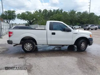 2013 Ford F-150 XL with VIN 1FTMF1CM9DFC13973, listed as a IAAI auction lot 42326721 with 209,911 mi miles and . Bid and sale history available at DreamBid. Image 13.