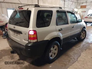 2006 Ford Escape XLT with VIN 1FMYU03196KA11342, listed as a IAAI auction lot 42237654 with 146,929 mi miles and . Bid and sale history available at DreamBid. Image 4.