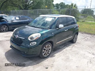 2014 FIAT 500L Lounge z VIN ZFBCFACH7EZ023283, wystawiony jako IAAI lot #42319623 z przebiegiem 129 414 mil mil oraz . Historia ofert i sprzedaży dostępna na DreamBid. Obrazek 2.