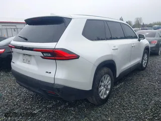 2024 Toyota Grand Highlander Hybrid XLE with VIN 5TDACAB50RS009866, listed as a IAAI auction lot 41976658 with 76,390 mi miles. Bid and sale history available at carsss.com. Image 4.