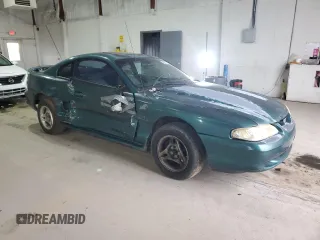 1996 Ford Mustang with VIN 1FALP4047TF229334, listed as a Copart auction lot 49257335 with 184,986 mi miles and Salvage Title. Bid and sale history available at carsss.com. Image 4.