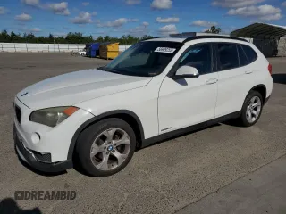 2014 BMW X1 sDrive28i z VIN WBAVM1C53EVW51203, wystawiony jako Copart lot #56909255 z przebiegiem 106 560 mil mil oraz Szkoda całkowita • Salvage title. Historia ofert i sprzedaży dostępna na DreamBid. Obrazek 1.