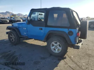2003 Jeep Wrangler X z VIN 1J4FA39S33P320254, wystawiony jako Copart lot #52392525 z przebiegiem 206 325 mil mil oraz Szkoda całkowita • Salvage title. Historia ofert i sprzedaży dostępna na DreamBid. Obrazek 2.
