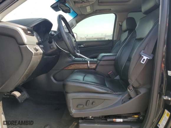 2017 Chevrolet Suburban Premier with VIN 1GNSCJKC0HR140111, listed as a Copart auction lot 74387664 with 104,094 mi miles and Salvage Title. Bid and sale history available at carsss.com. Image 7.