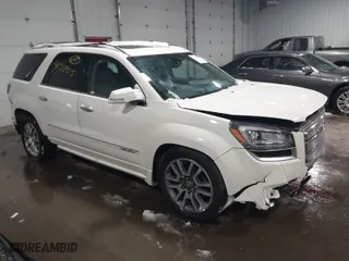 2014 GMC Acadia Denali with VIN 1GKKVTKD2EJ225389, listed as a IAAI auction lot 41718955 with 126,865 mi miles. Bid and sale history available at carsss.com. Image 1.