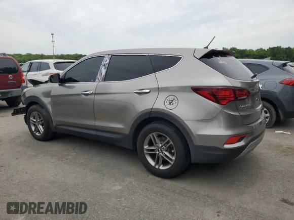 2018 Hyundai Santa Fe 2.4L with VIN 5XYZTDLB9JG563224, listed as a Copart auction lot 58470265 with 133,844 mi miles and Salvage title. Bid and sale history available at DreamBid. Image 2.