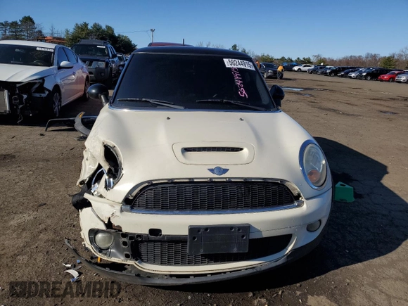 2007 MINI Hardtop S with VIN WMWMF73577TT86065, listed as a Copart auction lot 57262795 with 100,052 mi miles and Salvage Title. Bid and sale history available at DreamBid. Image 5.