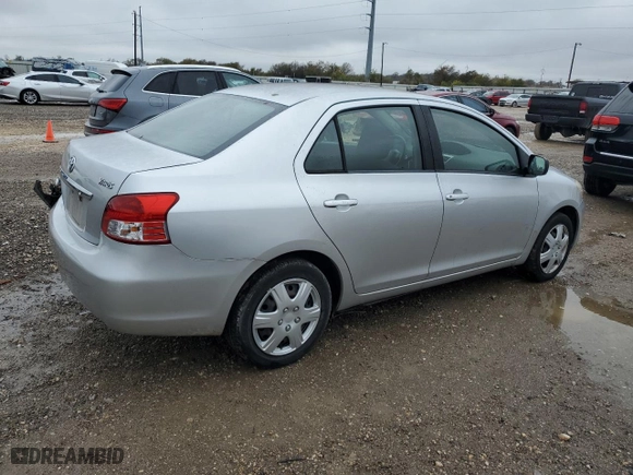 2012 Toyota Yaris with VIN JTDBT4K35CL019807, listed as a Copart auction lot 83393134 with 121,623 mi miles and Salvage Title. Bid and sale history available at carsss.com. Image 3.