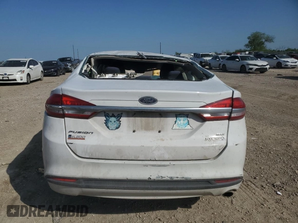 2017 Ford Fusion Hybrid SE с VIN 3FA6P0LU8HR356816, выставлен на аукционе Copart как лот 51005915 с пробегом Не указан миль и Списание • Salvage title. История ставок и продаж доступна на DreamBid. Изображение 6.