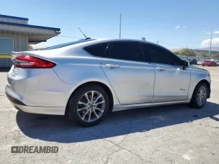 2017 Ford Fusion Hybrid SE with VIN 3FA6P0LUXHR266132, listed as a Copart auction lot 56255565 with 182,458 mi miles and Salvage title. Bid and sale history available at DreamBid. Image 3.