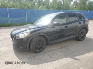 2014 Mazda CX-5 Sport with VIN JM3KE2BE0E0314048, listed as a Copart auction lot 60391585 with 138,527 mi miles and Salvage title. Bid and sale history available at DreamBid. Image 1.
