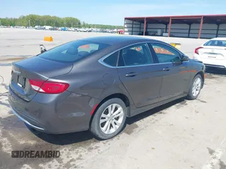 2015 Chrysler 200 Limited z VIN 1C3CCCAB2FN569986, wystawiony jako IAAI lot #42129729 z przebiegiem 100 794 mil mil oraz . Historia ofert i sprzedaży dostępna na DreamBid. Obrazek 4.