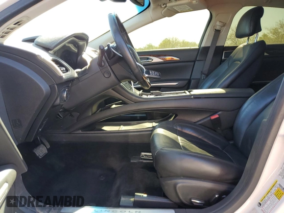 2014 Lincoln MKZ with VIN 3LN6L2JK0ER819896, listed as a Copart auction lot 57110025 with Not provided miles and Salvage title. Bid and sale history available at DreamBid. Image 7.