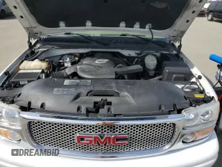 2005 GMC Sierra Denali z VIN 2GTEK63N951344416, wystawiony jako Copart lot #45877865 z przebiegiem 150 707 mil mil oraz Nie do naprawy. Historia ofert i sprzedaży dostępna na DreamBid. Obrazek 11.