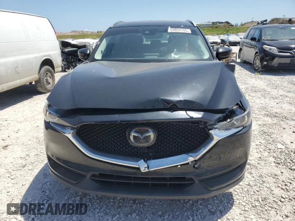 2018 Mazda CX-5 Touring with VIN JM3KFACM2J1327725, listed as a Copart auction lot 54894765 with 56,194 mi miles and Salvage Title. Bid and sale history available at carsss.com. Image 5.