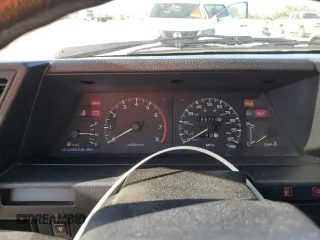 1987 Nissan Sentra z VIN JN1PB2411HU026525, wystawiony jako Copart lot #78997744 z przebiegiem 65 716 mil mil oraz Nie do naprawy. Historia ofert i sprzedaży dostępna na DreamBid. Obrazek 9.