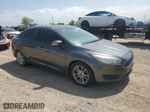 2016 Ford Focus SE with VIN 1FADP3F28GL267599, listed as a Copart auction lot 50965695 with 140,950 mi miles and Clean Title. Bid and sale history available at carsss.com. Image 4.