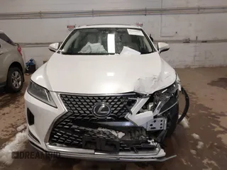 2021 Lexus RX with VIN 2T2HGMDA6MC064446, listed as a IAAI auction lot 41108859 with 116,930 mi miles. Bid and sale history available at carsss.com. Image 12.
