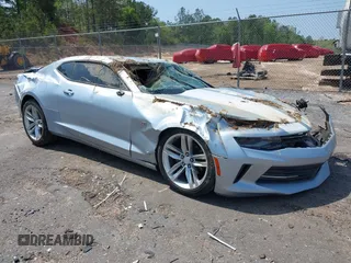 2018 Chevrolet Camaro 1LT z VIN 1G1FB1RS9J0111669, wystawiony jako IAAI lot #41898160 z przebiegiem Nie podano mil oraz . Historia ofert i sprzedaży dostępna na DreamBid. Obrazek 1.
