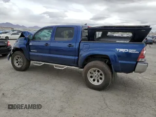 2014 Toyota Tacoma with VIN 5TFLU4EN7EX106909, listed as a Copart auction lot 46906235 with 102,681 mi miles and Salvage Title. Bid and sale history available at DreamBid. Image 2.