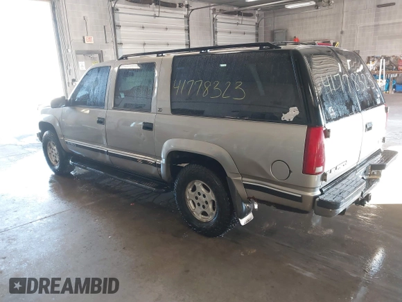 1999 GMC Suburban with VIN 3GKFK16R7XG549530, listed as a IAAI auction lot 41778323 with 174,866 mi miles and . Bid and sale history available at DreamBid. Image 3.