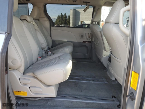 2014 Toyota Sienna XLE with VIN 5TDYK3DC8ES472826, listed as a Copart auction lot 46174385 with 129,094 mi miles and Salvage Title. Bid and sale history available at carsss.com. Image 12.