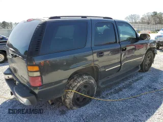 2004 Chevrolet Tahoe LS z VIN 1GNEC13Z04R220177, wystawiony jako Copart lot #48406255 z przebiegiem 215 167 mil mil oraz Szkoda całkowita • Salvage title. Historia ofert i sprzedaży dostępna na DreamBid. Obrazek 3.
