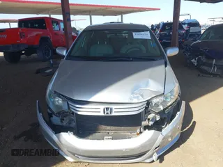 2010 Honda Insight LX z VIN JHMZE2H53AS007016, wystawiony jako IAAI lot #42096274 z przebiegiem 173 519 mil mil oraz . Historia ofert i sprzedaży dostępna na DreamBid. Obrazek 12.