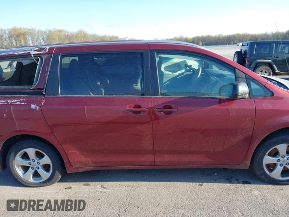 2012 Toyota Sienna with VIN 5TDKA3DC0CS013845, listed as a IAAI auction lot 42010389 with 209,272 mi miles and . Bid and sale history available at DreamBid. Image 14.