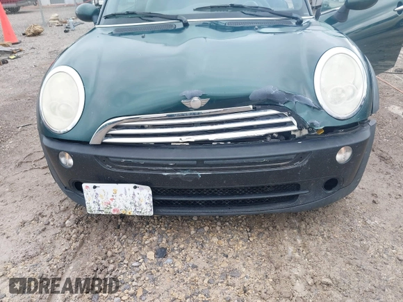 2005 MINI Convertible with VIN WMWRF33495TG11818, listed as a IAAI auction lot 42351446 with 100,033 mi miles and . Bid and sale history available at DreamBid. Image 6.