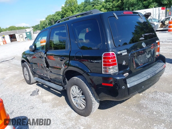 2005 Mercury Mariner Luxury z VIN 4M2CU57195DJ25375, wystawiony jako IAAI lot #42717392 z przebiegiem 65 400 mil mil oraz . Historia ofert i sprzedaży dostępna na DreamBid. Obrazek 3.