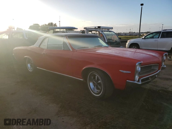 1966 Pontiac GTO z VIN 235676P261739, wystawiony jako Copart lot #75633424 z przebiegiem 23 103 mil mil oraz Szkoda całkowita • Salvage title. Historia ofert i sprzedaży dostępna na DreamBid. Obrazek 4.