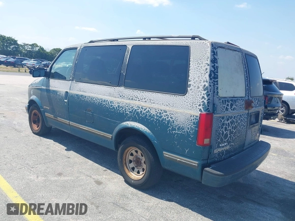 1998 GMC Safari z VIN 1GKDM19W7WB500418, wystawiony jako IAAI lot #42072710 z przebiegiem Nie podano mil oraz . Historia ofert i sprzedaży dostępna na DreamBid. Obrazek 3.