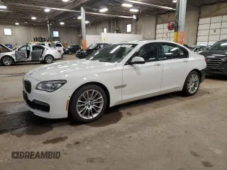 2015 BMW 7 Series 750i xDrive with VIN WBAYB6C54FD965787, listed as a Copart auction lot 89061355 with 104,633 mi miles and Salvage Title. Bid and sale history available at carsss.com. Image 1.