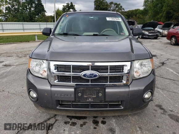 2012 Ford Escape XLT с VIN 1FMCU9DGXCKB34077, выставлен на аукционе Copart как лот 71502944 с пробегом 297 902 миль миль и Списание • Salvage title. История ставок и продаж доступна на DreamBid. Изображение 5.