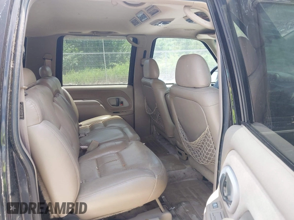 1996 Chevrolet Suburban with VIN 3GNEC16R3TG120004, listed as a IAAI auction lot 42752410 with 291,491 mi miles and . Bid and sale history available at DreamBid. Image 8.