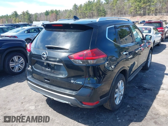2017 Nissan Rogue SV with VIN KNMAT2MV7HP593405, listed as a IAAI auction lot 42026064 with 184,161 mi miles. Bid and sale history available at carsss.com. Image 4.